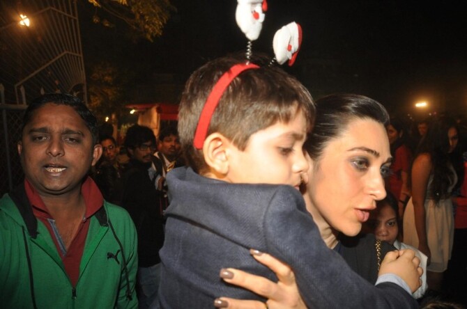 Karisma Kapoor with son Kiaan Raj Kapoor at the midnight mass for ...